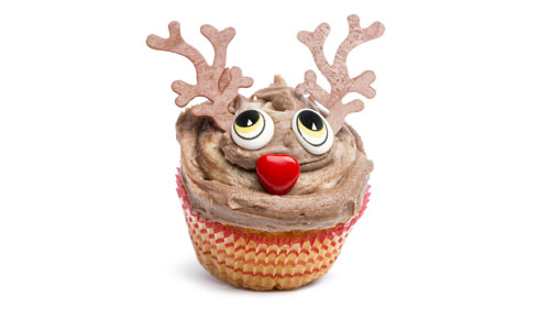 A festive decorated cup cake